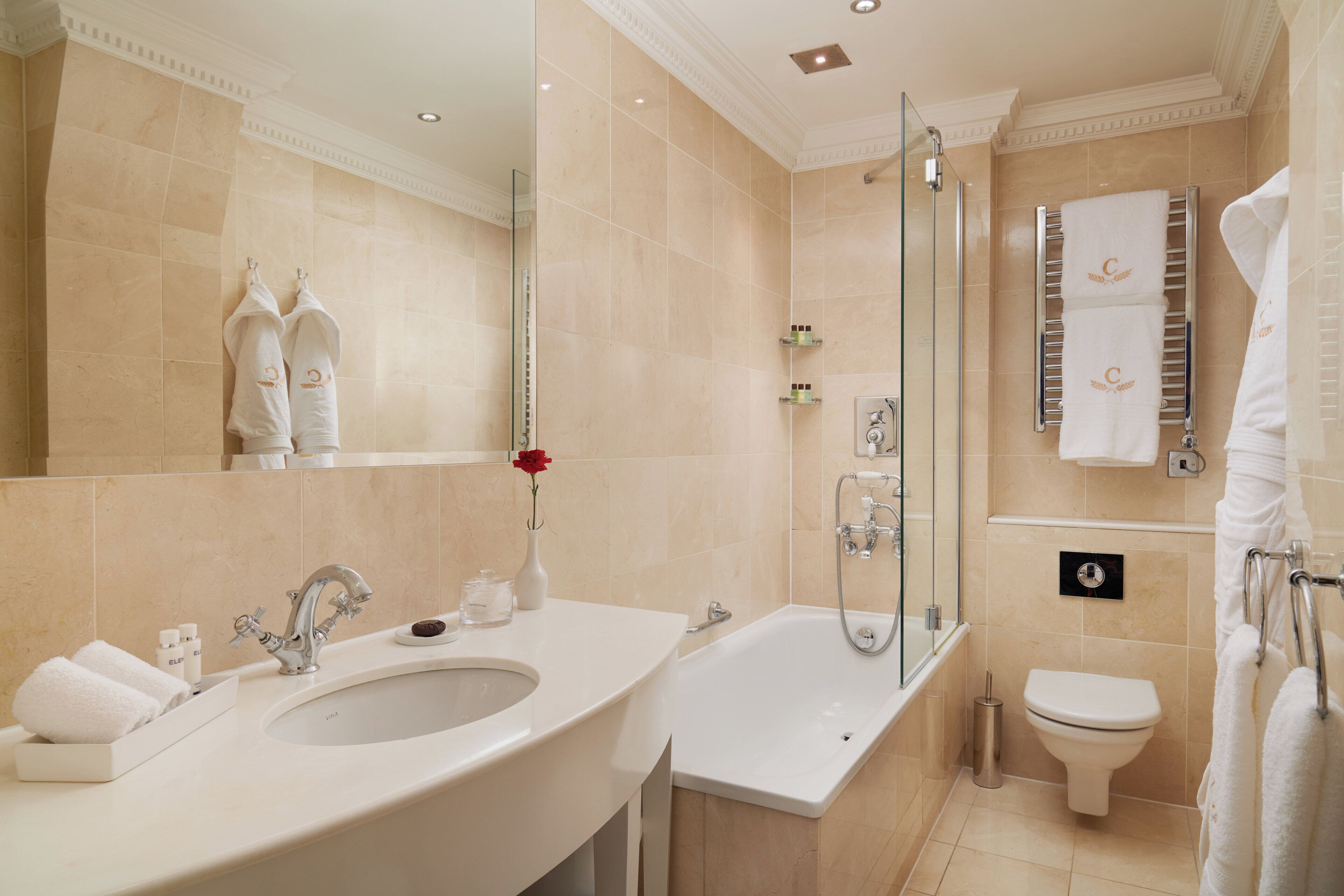 superior twin room | bathroom | combined shower/bathtub, eco-friendly toiletries, hair dryer, bathrobes