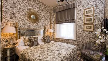 Premium bedding, down comforters, in-room safe, individually decorated