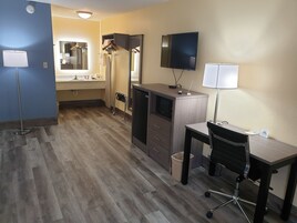 Studio Suite, 1 King Bed, Non Smoking | Bathroom amenities | Combined shower/tub, designer toiletries, hair dryer, towels