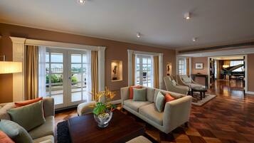 Presidential Suite, 2 Bedrooms | Living area | 32-inch LCD TV with satellite channels, TV