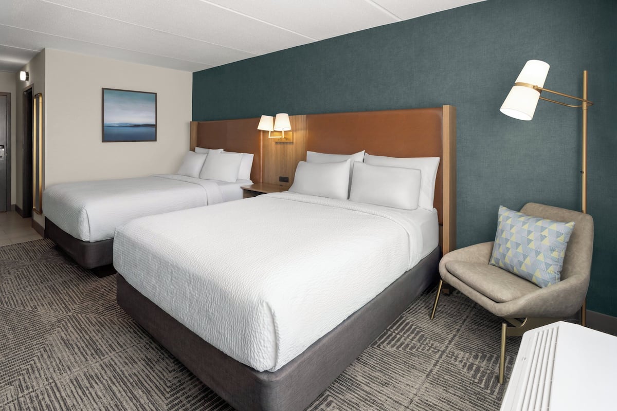Premium bedding, pillowtop beds, desk, blackout drapes
