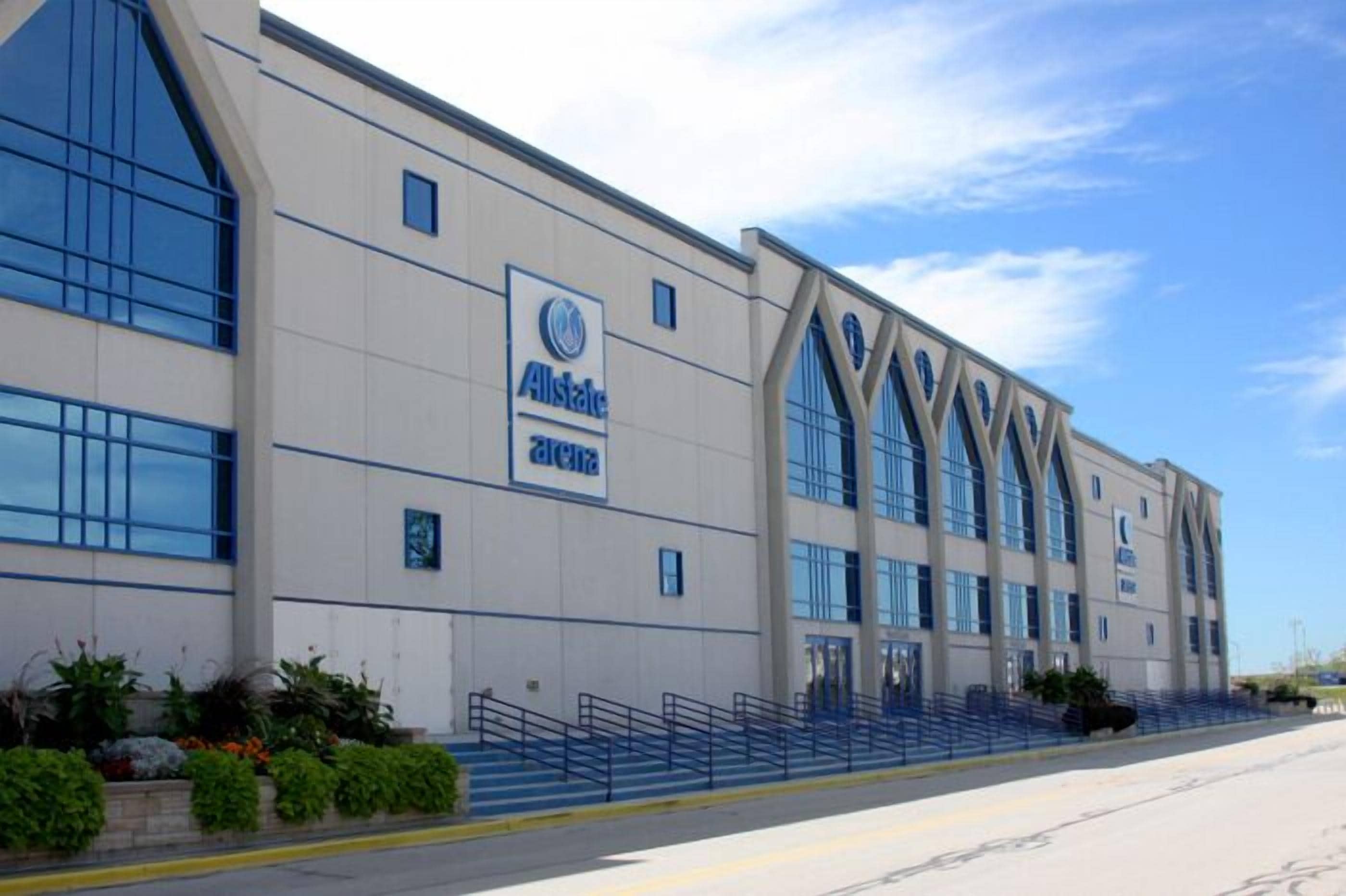 A modern building with a large sign reading "Allstate Insurance".