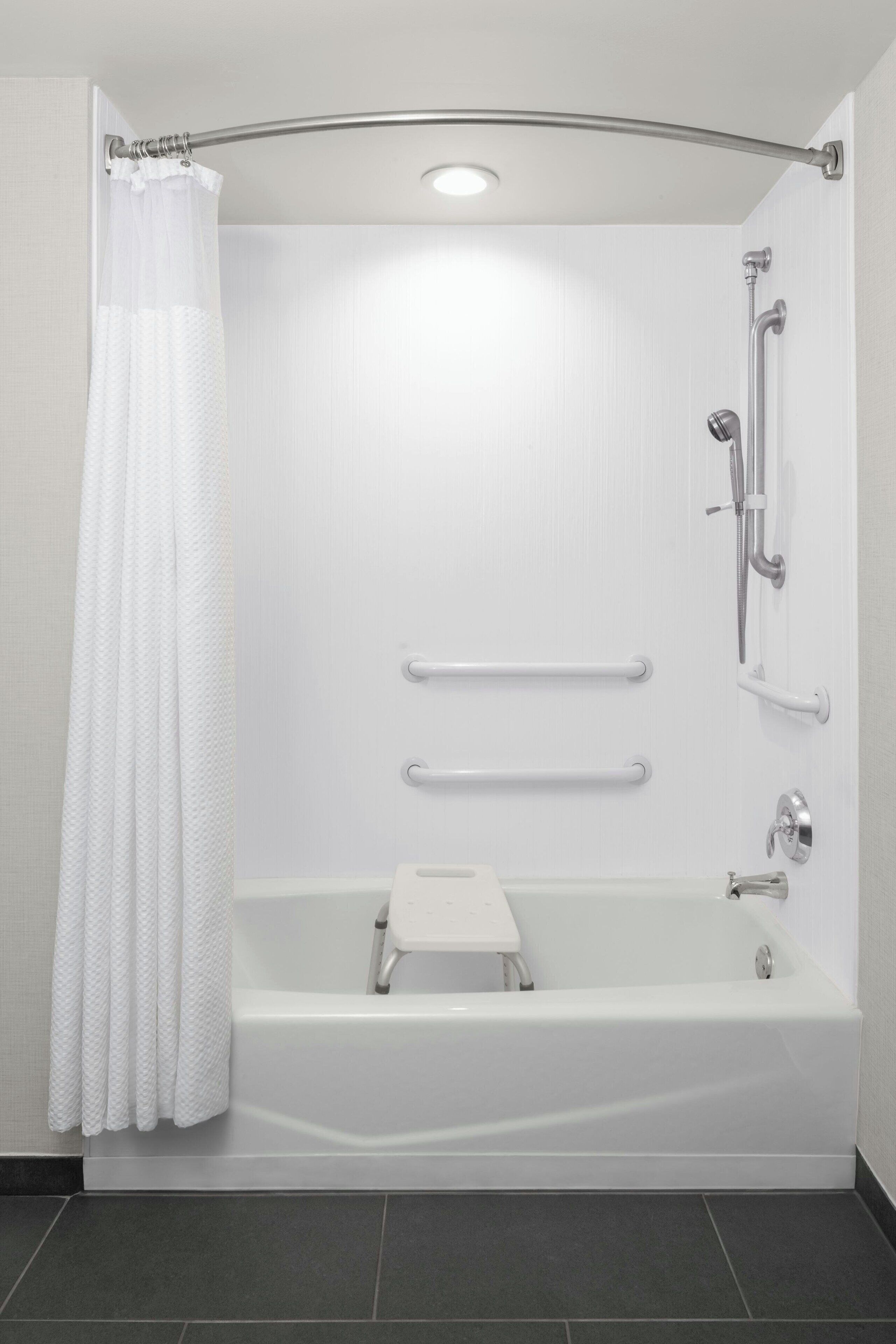 combined shower/bathtub, eco-friendly toiletries, hair dryer, towels