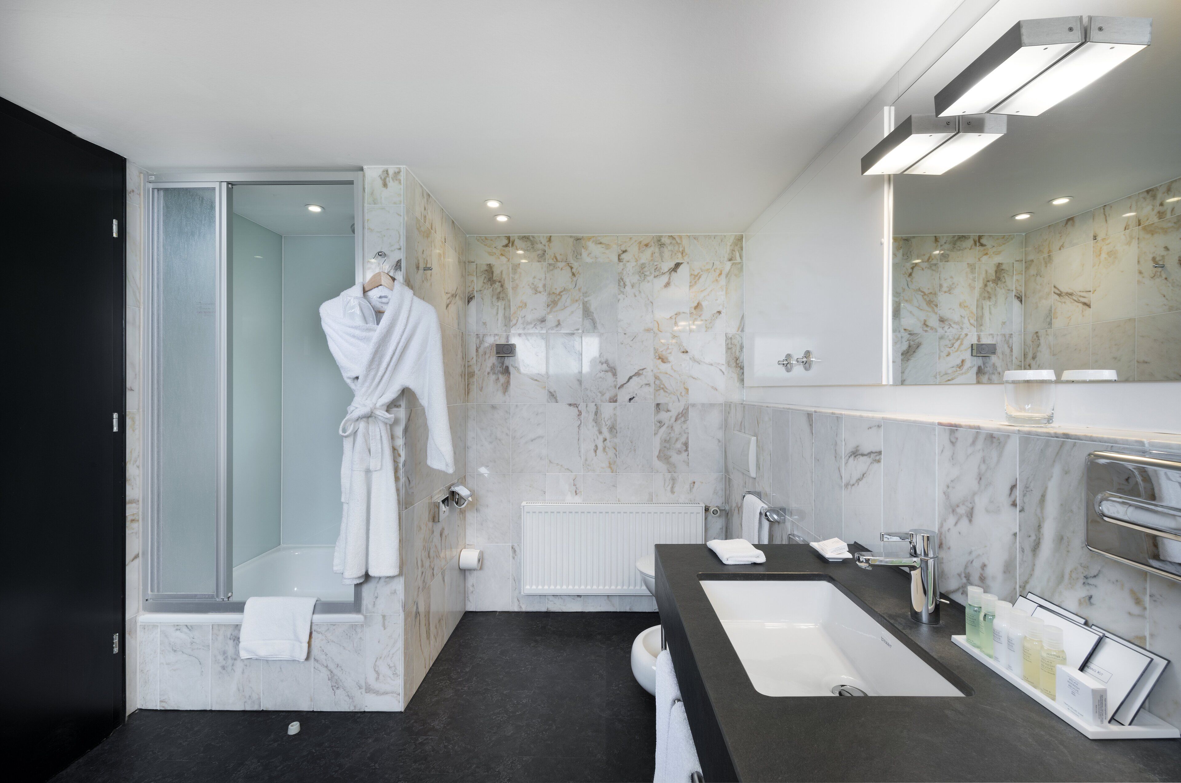 combined shower/bathtub, deep-soaking bathtub, eco-friendly toiletries