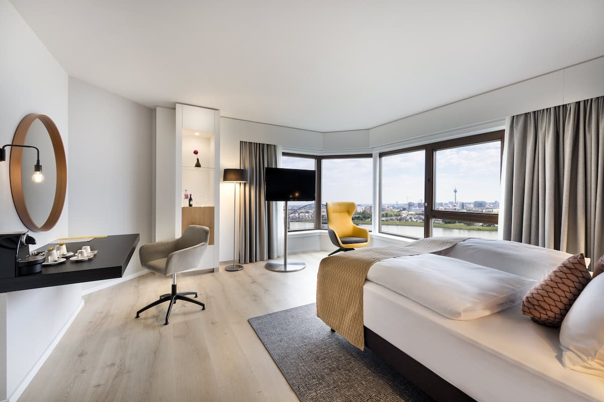 Premium Room, 1 King Bed, River View | 1 bedroom, hypo-allergenic bedding, in-room safe, laptop workspace