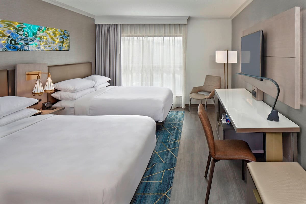 Premium bedding, down comforters, pillowtop beds, in-room safe