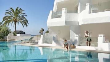 Double Room, Pool Access | Minibar, in-room safe, individually decorated, individually furnished
