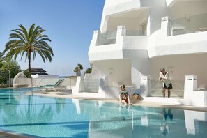 Double Room, Pool Access | Minibar, in-room safe, individually decorated, individually furnished