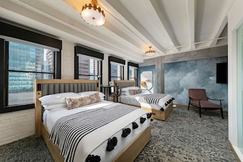 Desk, laptop workspace, iron/ironing board, free cribs/infant beds at The Wayfarer Downtown LA, Tapestry Collection by Hilton