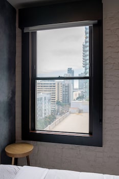 Hotel room view looking out at The Wayfarer Downtown LA, Tapestry Collection by Hilton