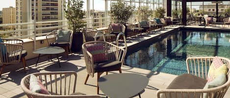 Rooftop bar, pool views, open daily