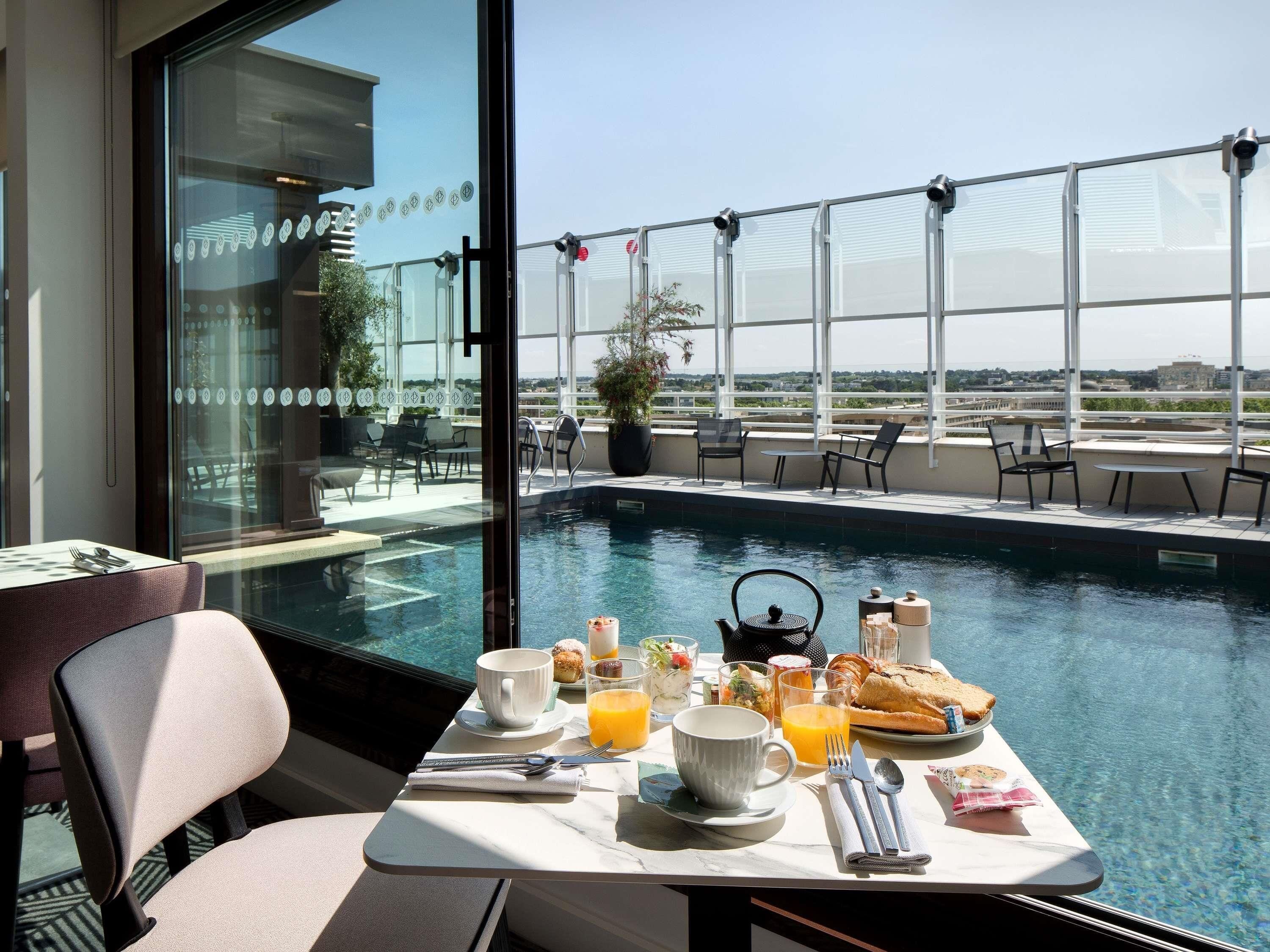 Rooftop bar, pool views, open daily