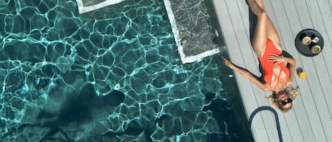 Rooftop bar, pool views, open daily
