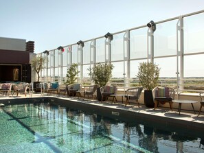 Indoor pool, seasonal outdoor pool, open 10 AM to 8 PM, sun loungers
