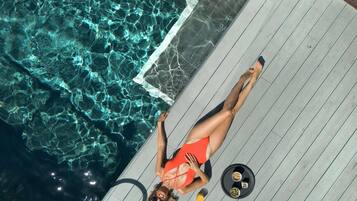 Rooftop bar, pool views, open daily