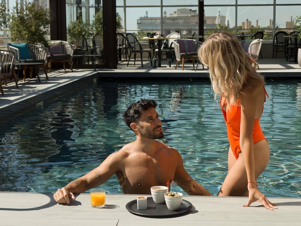 Rooftop bar, pool views, open daily