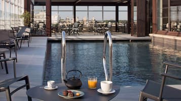 Breakfast, lunch, dinner served; Mediterranean cuisine, pool views