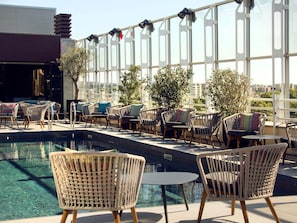 Indoor pool, seasonal outdoor pool, open 10 AM to 8 PM, sun loungers
