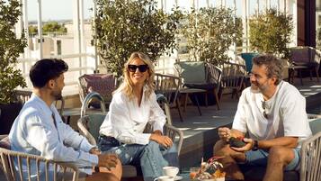 Rooftop bar, pool views, open daily