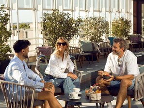 Rooftop bar, pool views, open daily