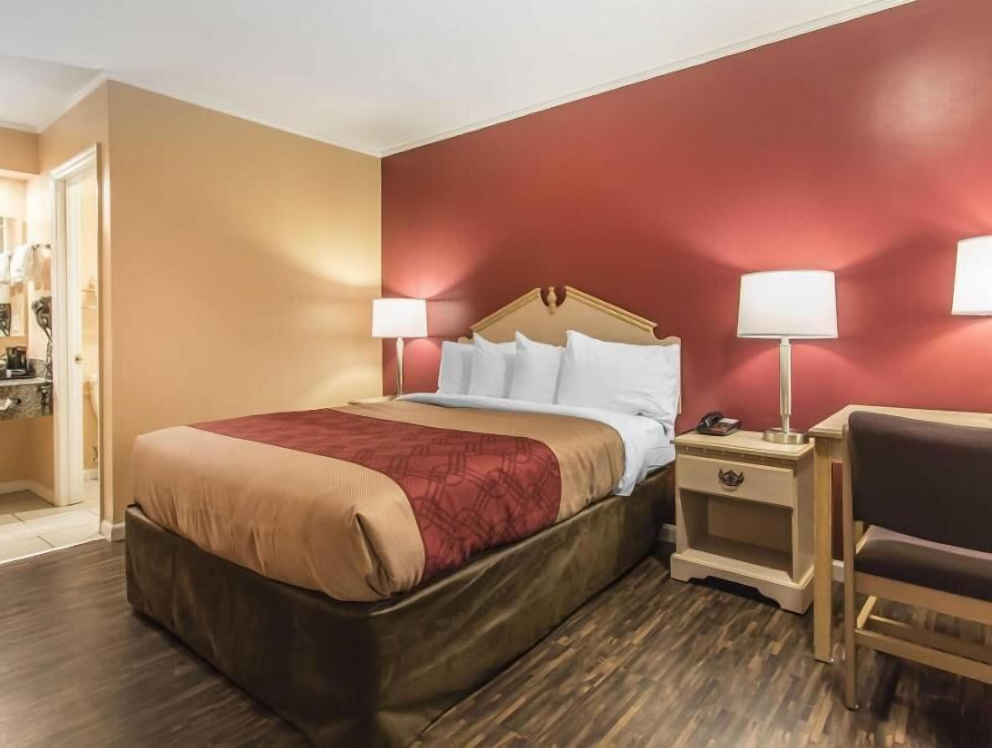 Premium bedding, desk, iron/ironing board, rollaway beds