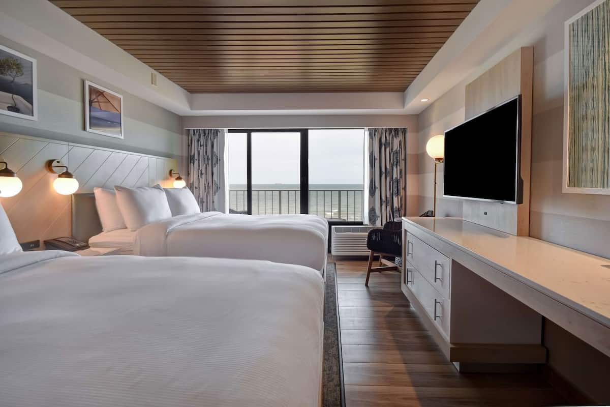 Down comforters, pillowtop beds, in-room safe, desk