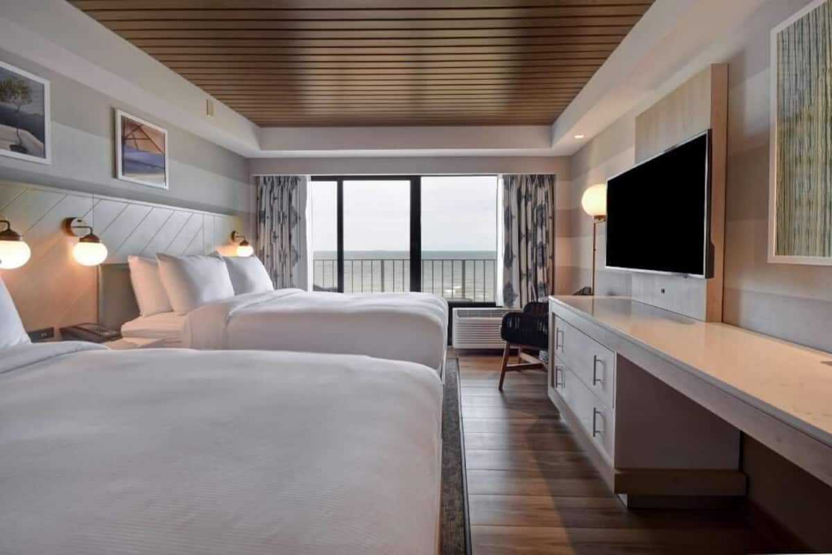 Down comforters, pillowtop beds, in-room safe, desk