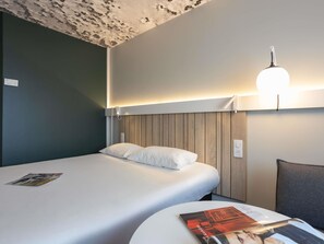 Hypo-allergenic bedding, desk, blackout drapes, soundproofing