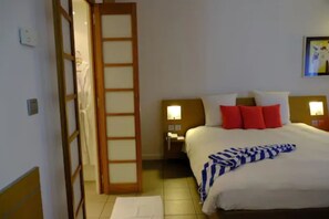 Suíte | Frigobar, cofres nos quartos, escrivaninha, cortinas blackout