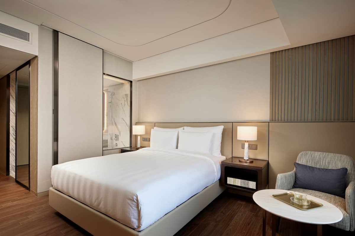 Premium bedding, down duvets, in-room safe, desk