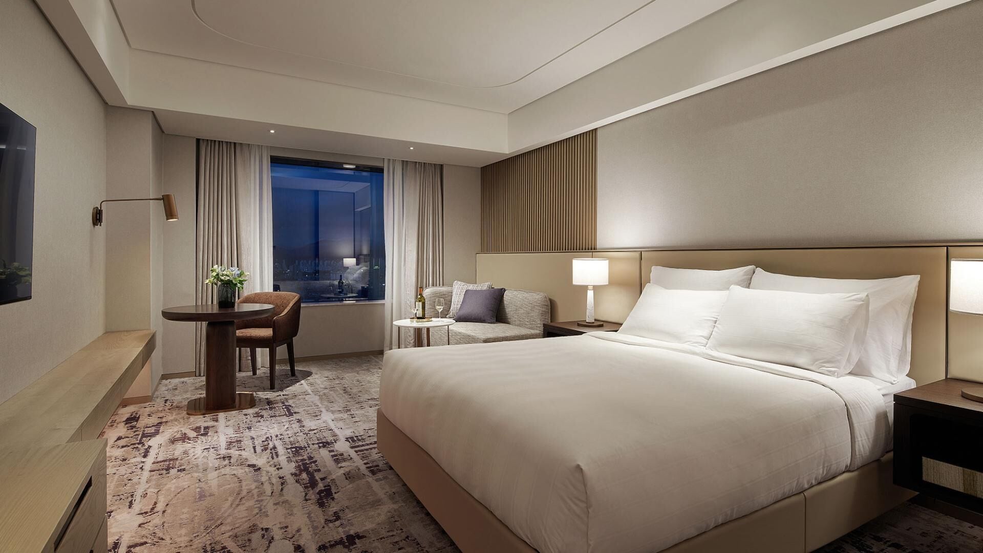 Premium bedding, down comforters, in-room safe, desk