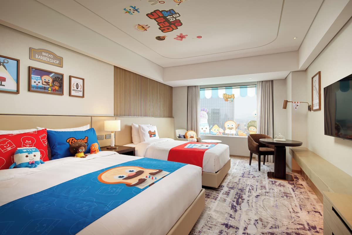 Premium bedding, down duvets, in-room safe, desk
