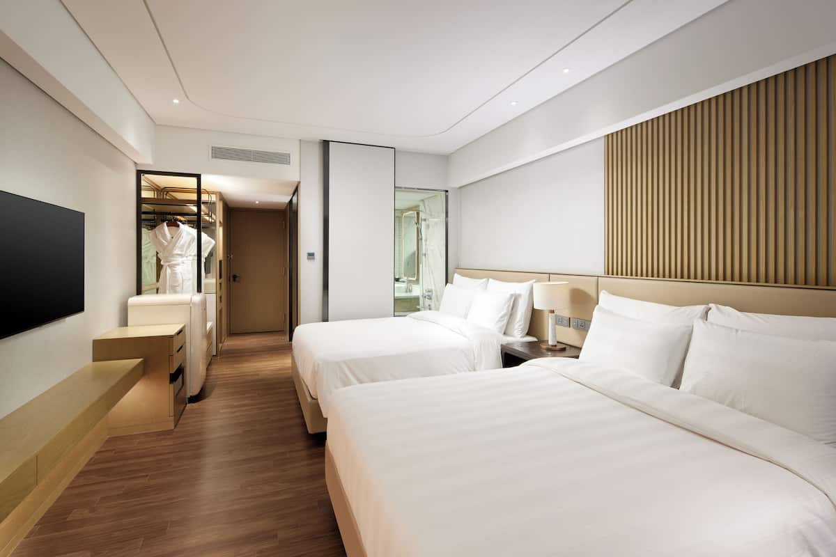 Premium bedding, down duvets, in-room safe, desk