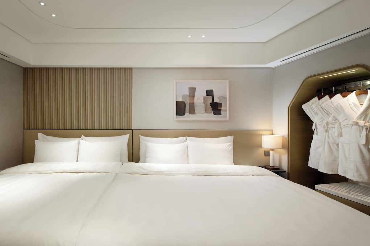 Premium bedding, down duvets, in-room safe, desk