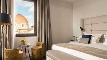 Suite, 1 cama Queen size | Ropa de cama de alta calidad y minibar