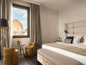 Suite, 1 cama Queen size | Ropa de cama de alta calidad y minibar 