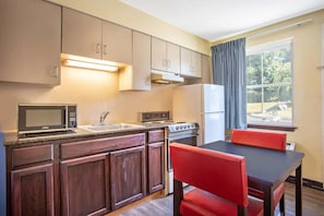 Deluxe Suite, 2 Queen Beds, Non Smoking | In-room safe, desk, iron/ironing board, free cribs/infant beds
