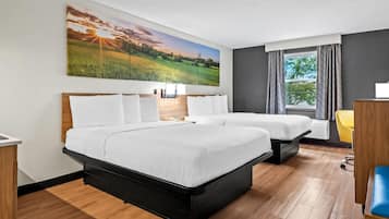 Suite Deluxe, 2 camas de matrimonio, no fumadores | Caja fuerte, escritorio, tabla de planchar con plancha y cunas gratuitas