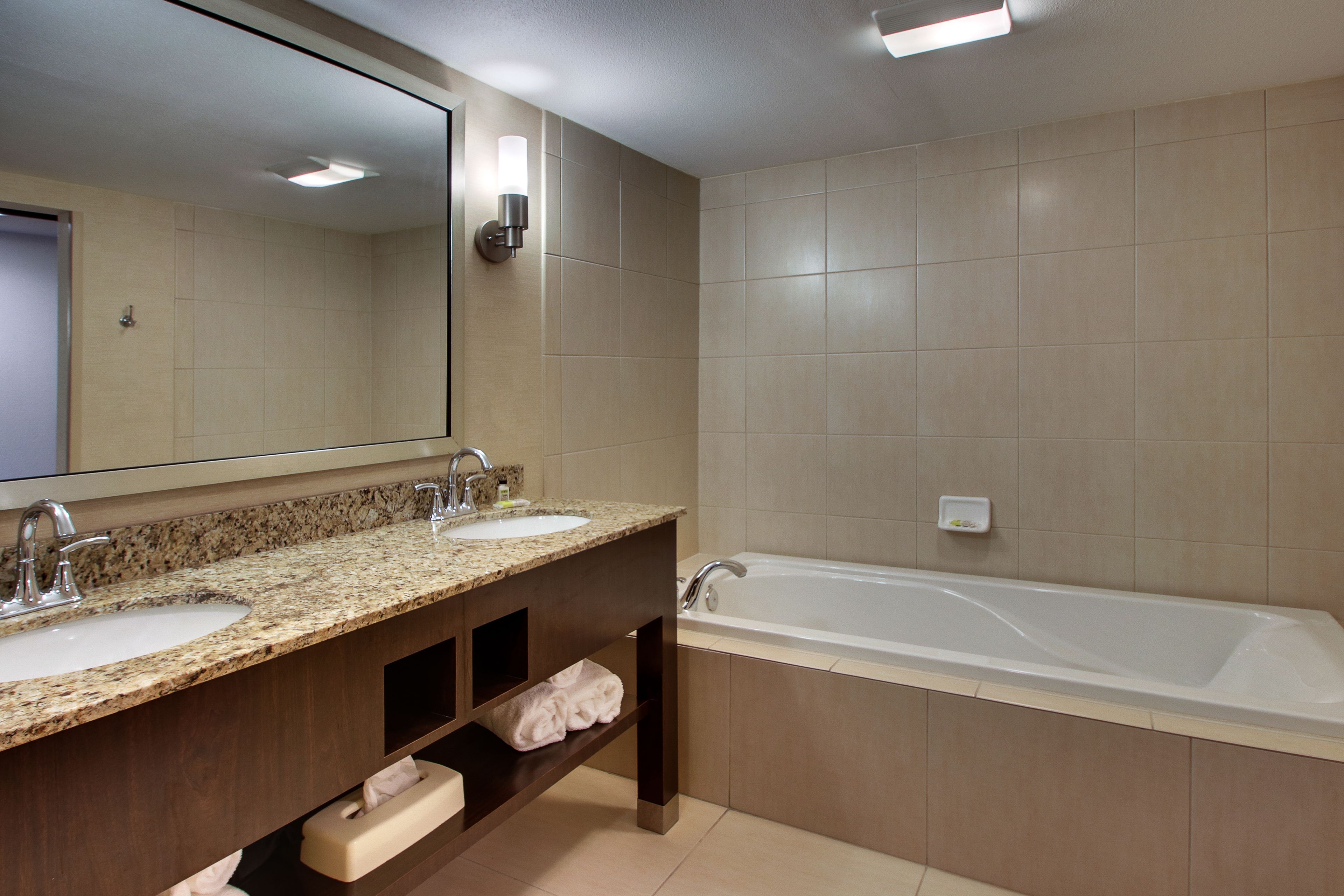 suite, 1 bedroom | bathroom | separate bathtub and shower, free toiletries, hair dryer, towels