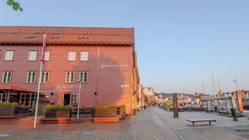 A red building with a sign for 'Radisson Blu Hotel' and '26 NORTH'.