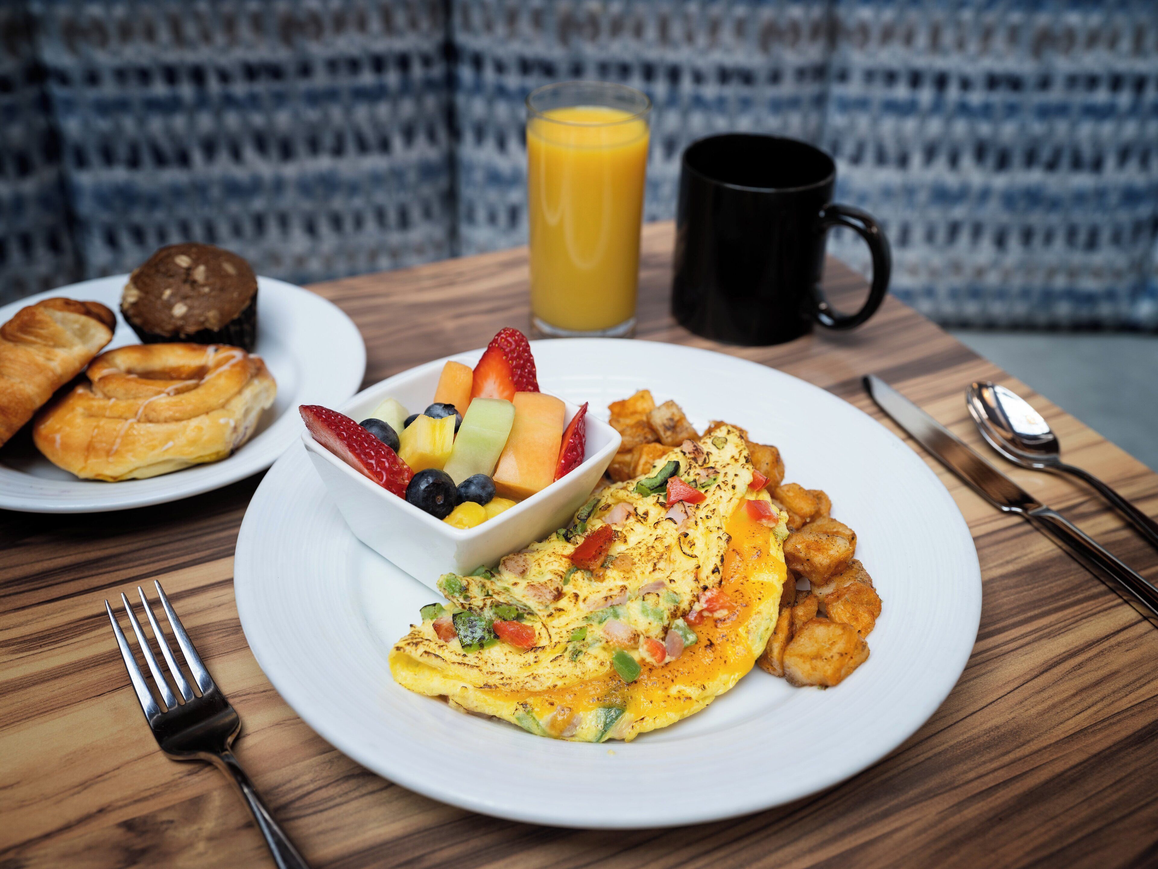 Daily buffet breakfast (USD 21 per person)