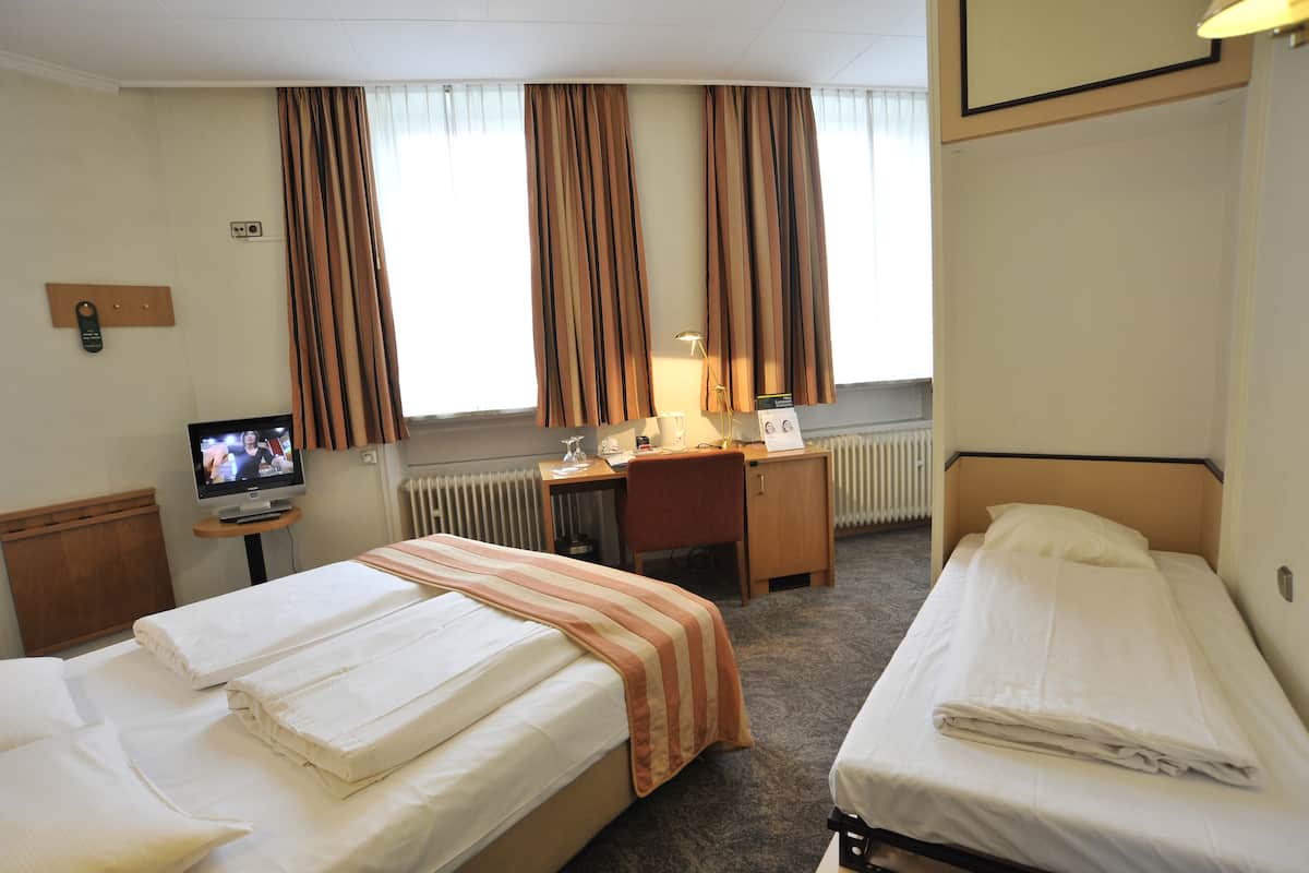 Chambre Triple | Literie de qualité supérieure, minibar, coffres-forts dans les chambres