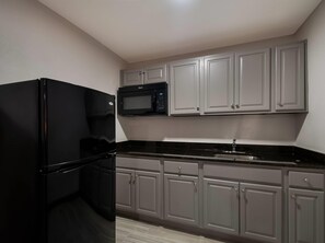 In-room safe, desk, laptop workspace, blackout curtains