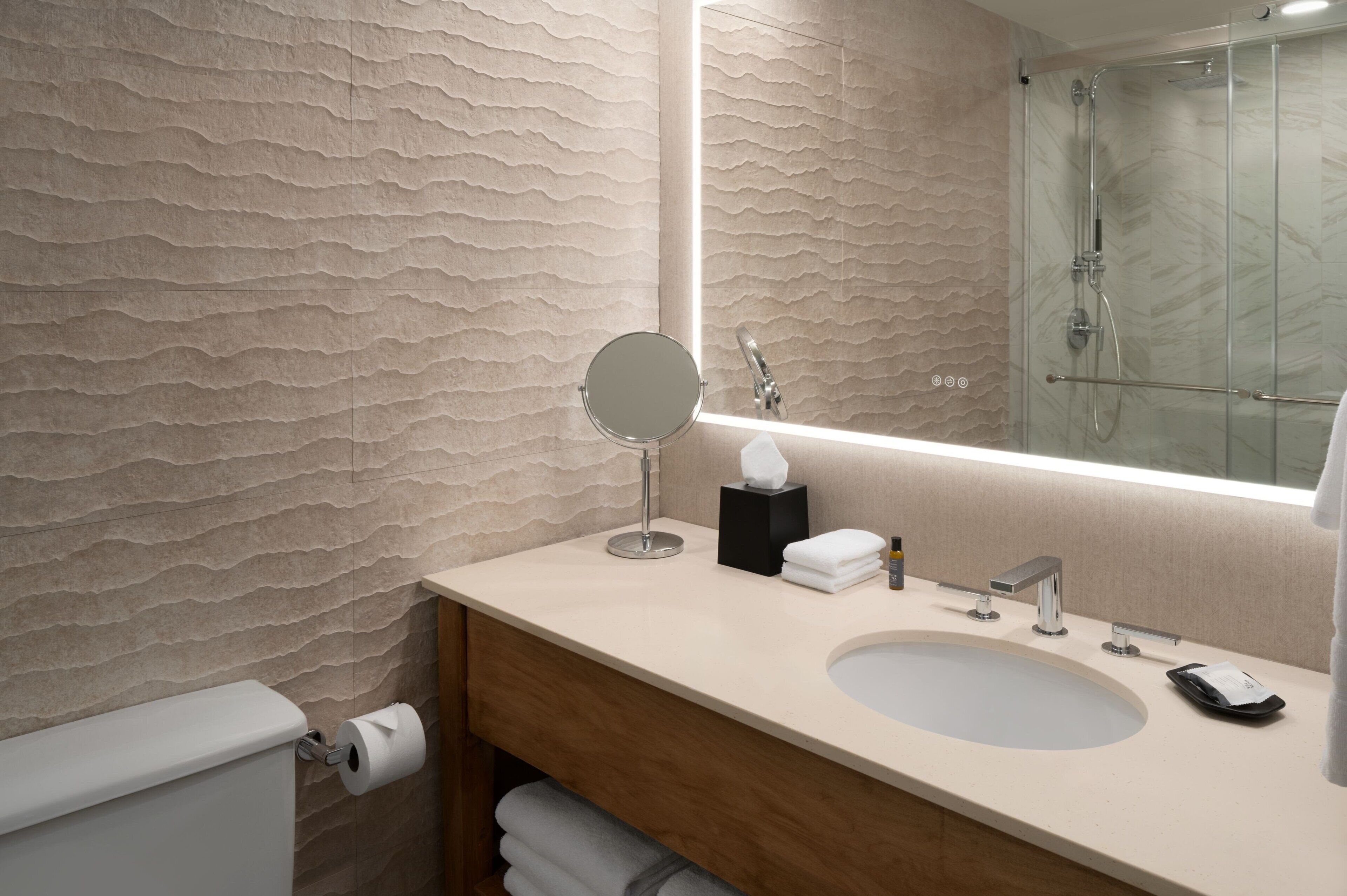 combined shower/bathtub, eco-friendly toiletries, hair dryer, bathrobes