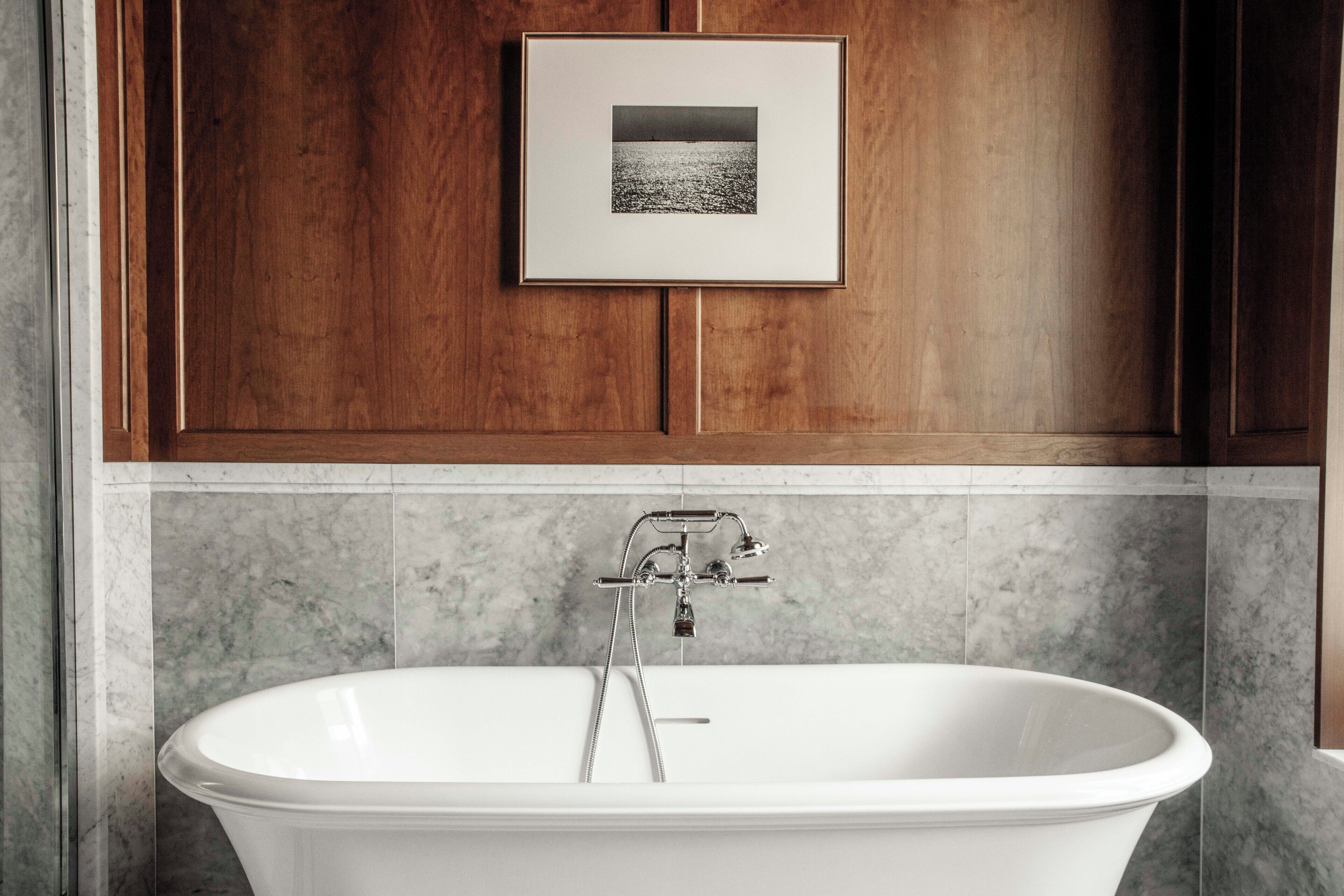 designer toiletries, hair dryer, bathrobes, slippers