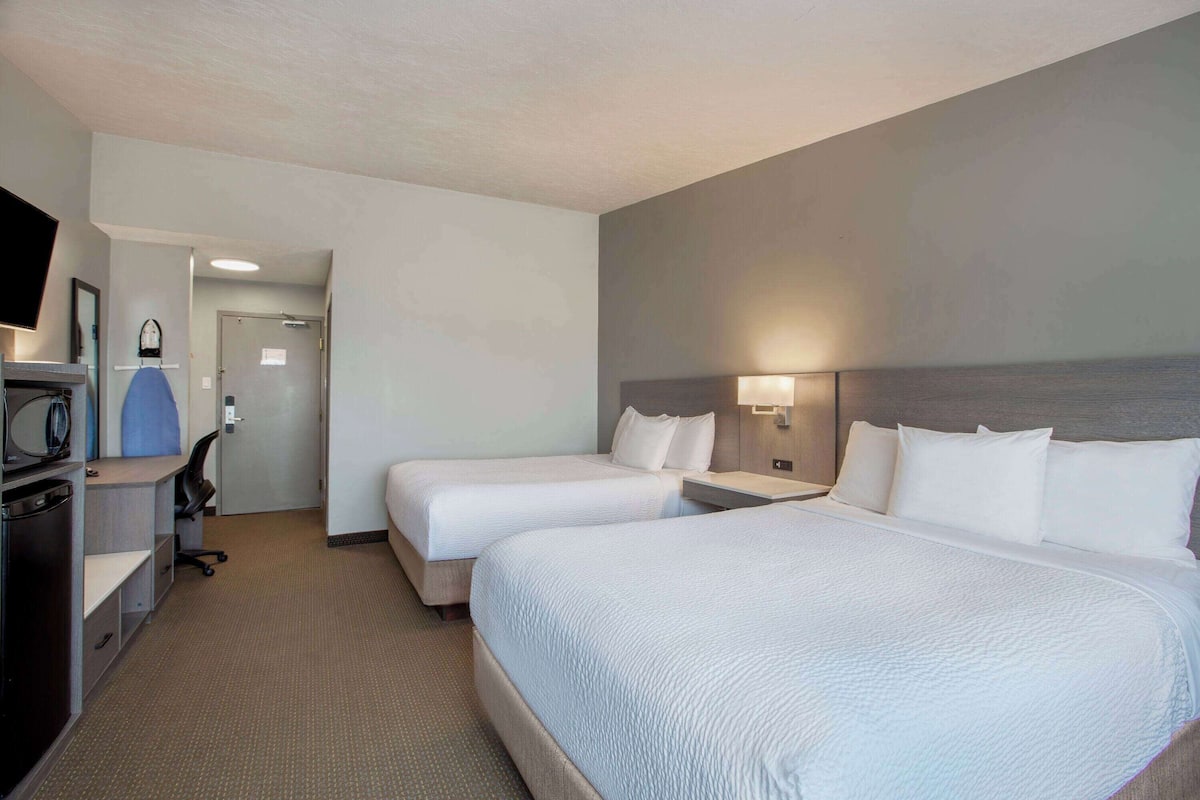 Room, 2 Queen Beds, Non Smoking, Ground Floor (Exterior Entrance) | In-room safe, desk, iron/ironing board, free cots/infant beds