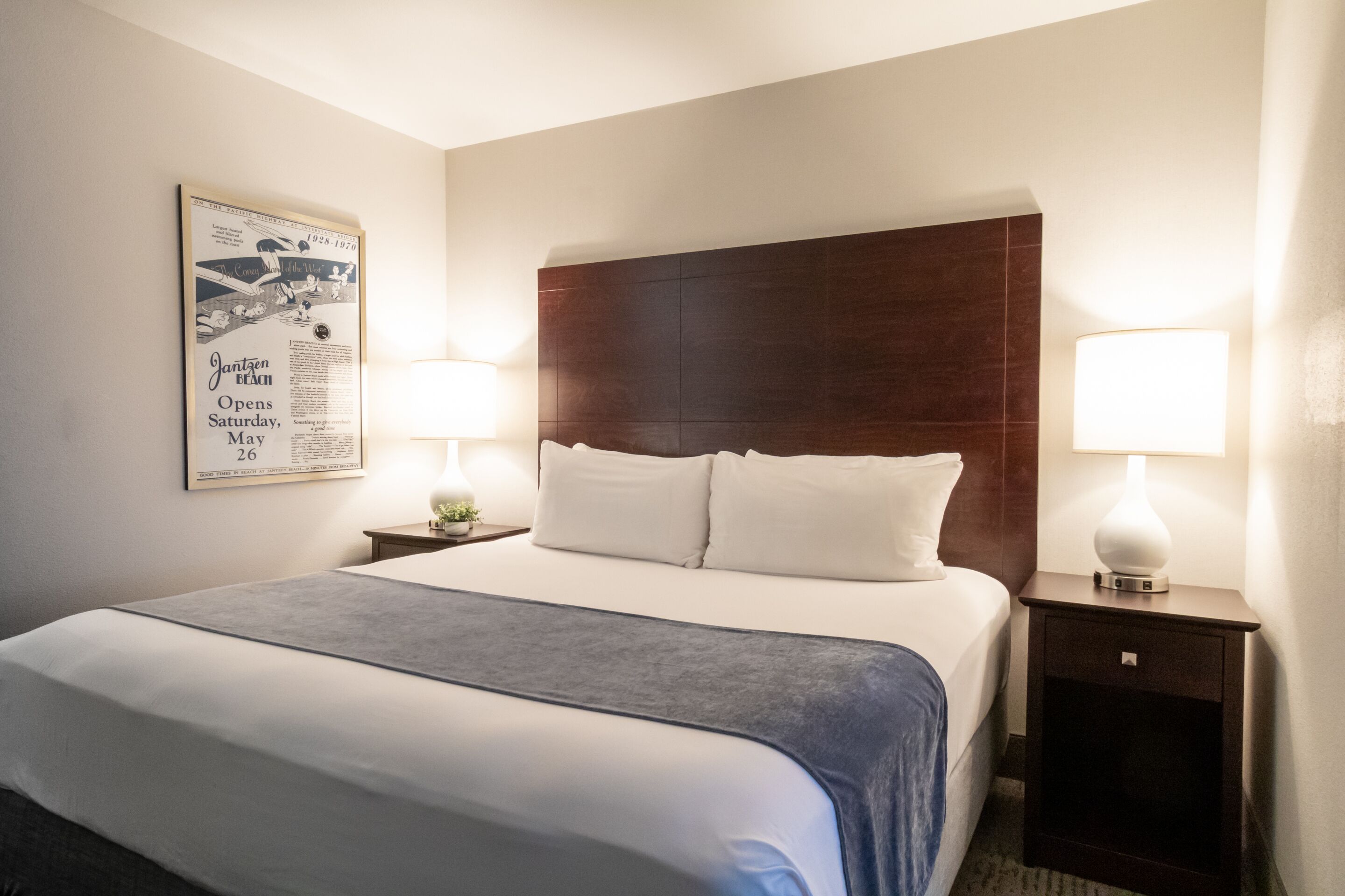 executive king suite sleeper sofa | premium bedding, desk, blackout curtains, iron/ironing board