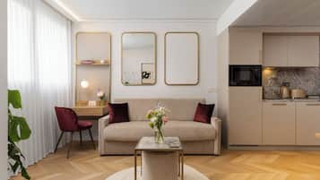 Appartement Élite, 1 chambre | Coin séjour | Télévision à écran plat