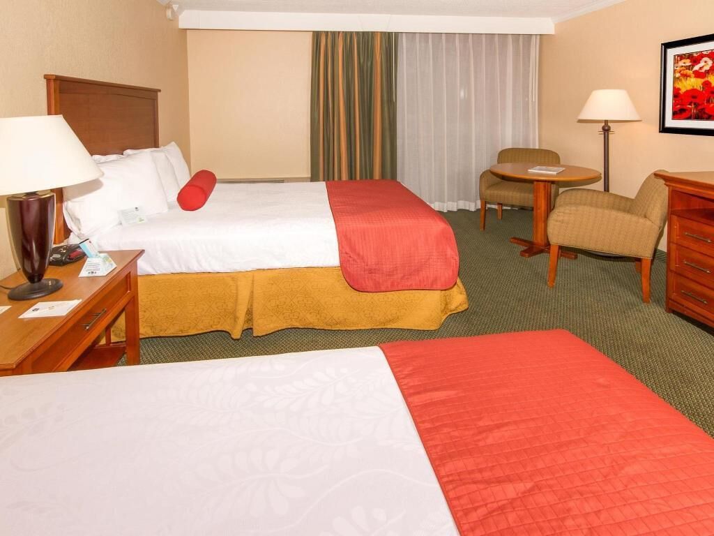 Desk, laptop workspace, iron/ironing board, free cots/infant beds