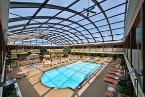 Indoor pool, open 8:00 AM to 10:00 PM, pool umbrellas, sun loungers